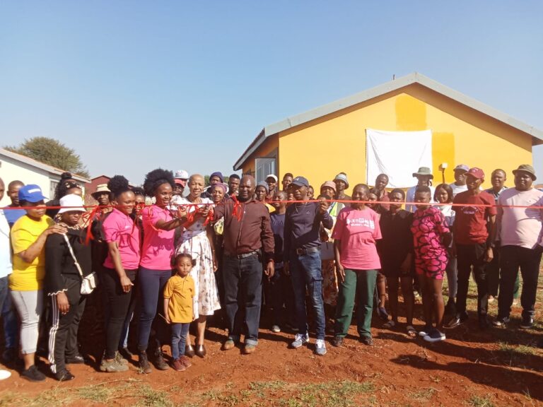 Officials cutting a ribbon officially opening a private clinic and a skills Centre in Rama City, Tshwane photo by Dimakatso Modipa