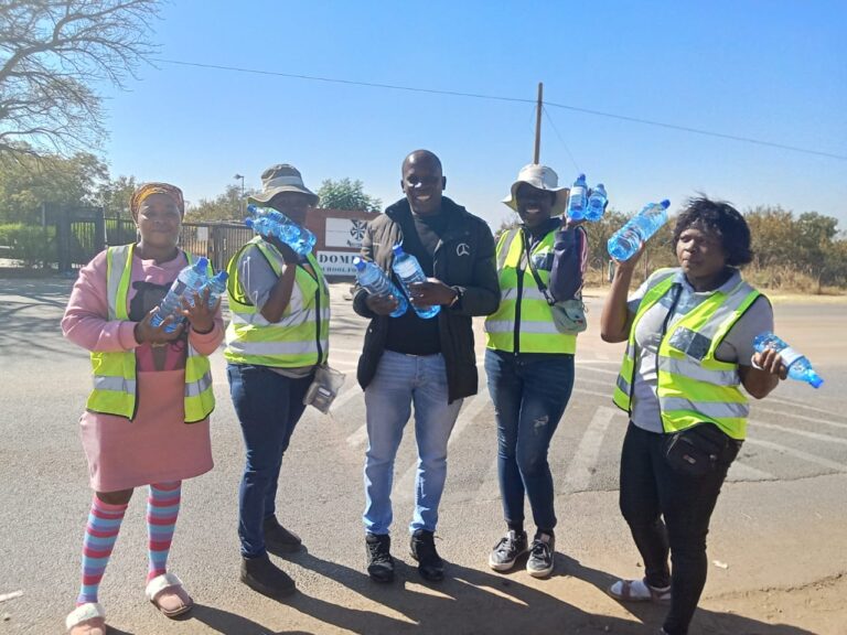 Tshwane most trusted and love traditional healer Dr Mulongo with 4 Hammanskraal ladies selling water photo by Dimakatso Modipa