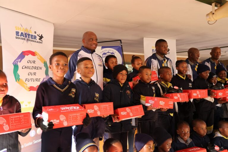 Shaka Easter Tournament President Tshepo Letjane, Nkateko Letjane, Jeff Masekwameng and Phalane Motale during the shoe donation ceremony at Matlapeng Primary School.