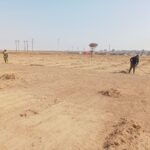 Ekangala residents clearing the empty land