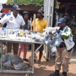 TMPD officials confiscating illegal goods