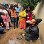 Executive Mayor Cllr Nasiphi Moya and the Mayoral Executive drinking water in Hammanskraal on Wednesday, 8 January 2025.