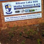 The wall at the gate of Ribane Laka Secondary School photo by Peter Mothiba