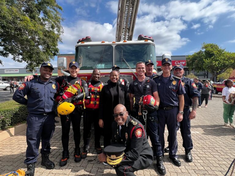 The executive mayor of City of Tshwane Dr Nasiphi Moya with the members of emergency services