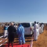 Karatekas lining up in a guard of honour as Lethabo Moshimane's hearse enters the Heatherly Cemetery