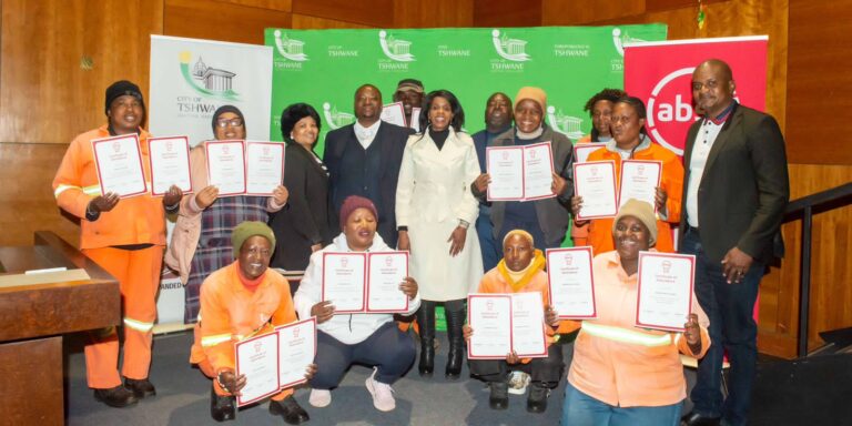 ABSA’s Team Leader of External Sales, Mr. Khudisi Makhaga joined by Councillor Sarah Mabotsa, MMC for Economic Development and Spatial Planning, with some of the participants of PEP and EPWP