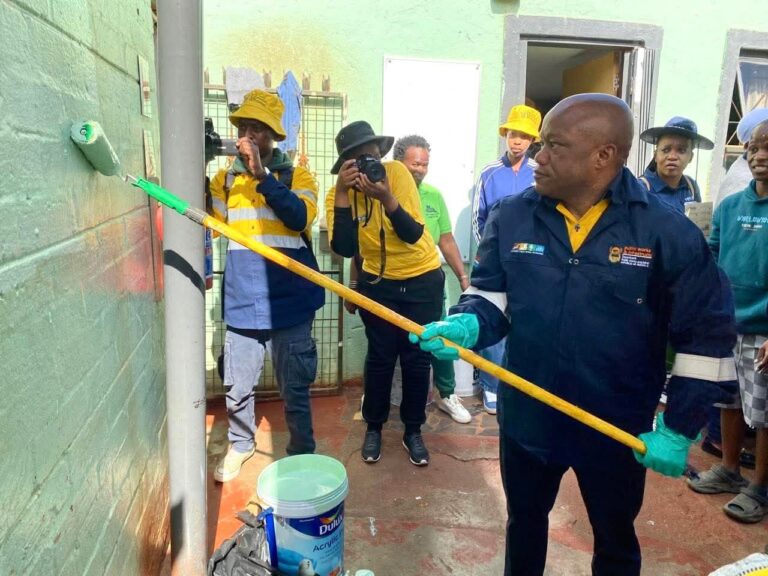 Deputy Minister Sihle Zikalala painting a wall at the Give Them Hope Foundation in Nellmapius on Mandela Day
