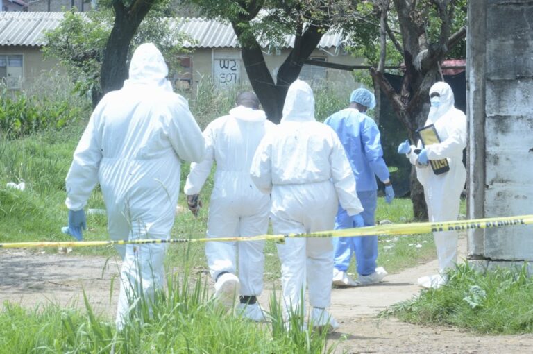 Forensic team at Saulsville hostel in Tshwane photo supplied