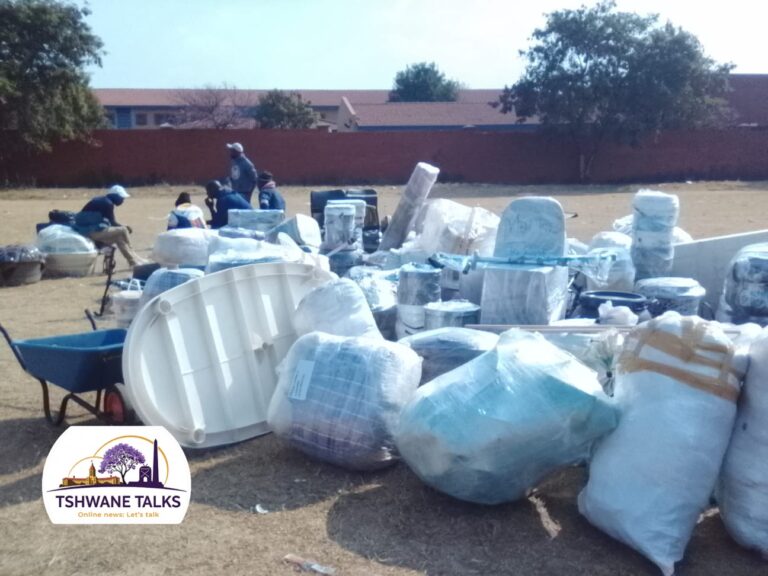 Zimbabweans going home from the Mamelodi East Police Station photo by Peter Mothiba